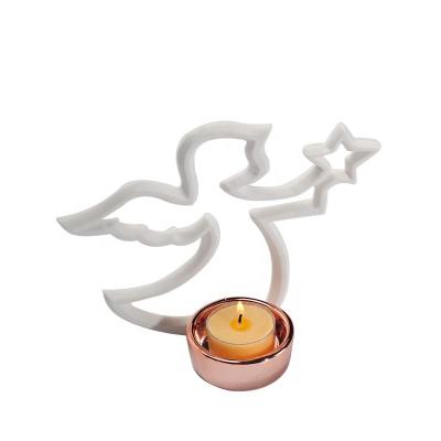 China Home Decoration Factory Direct Customized White Ceramic Candle Holders,Angel Style Tea Light Candle Holders On Sale for sale