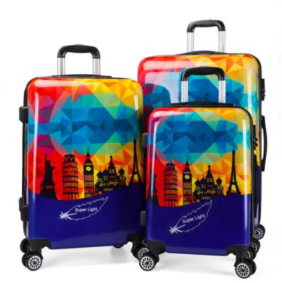 China Colorful Printed Pure PC PC Trolley Cases Aluminum Frame Luggage Bag Travel Suitcase for sale