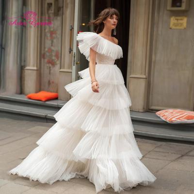 China Dry Clean Aster Garden One Shoulder Wedding Dresses Vestido 2021 De Noiva Tiered Ruffles Tulle Sleeveless Beach A Line Bridal Gowns for sale