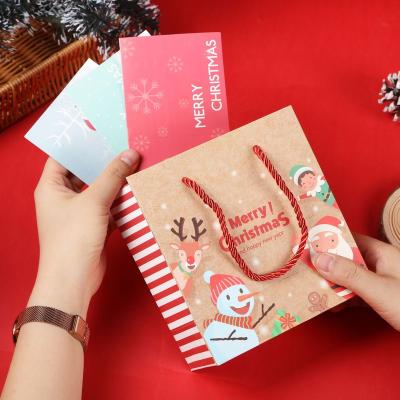 China Recyclable Custom Kraft Paper Bag With Wedding Christmas Design Kids Party Bags Small Gift Bags With Handle for sale