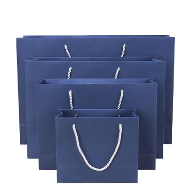 China Recyclable Custom Unique Color Printed Commercial Luxury Shopping Paper Gift Bag With Handle for sale