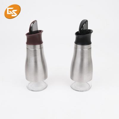 China Stainless Steel Viable Oil Dispenser Bottle Automatic Flip Condiment Container With Automatic Cover And Cap for sale