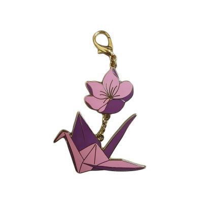 China Brass / zinc alloy silver metal keychains cranes with purple flower logo key chain customized key chain accessories for sale