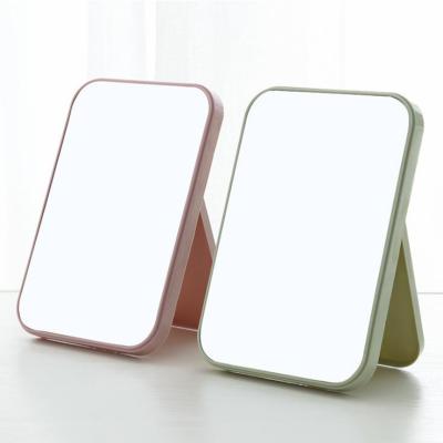 China HD minimalist creative square folding makeup mirror princess portable desktop colorful single-sided mirror to dress up mirror for sale