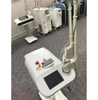 China Acne Treatment Low Price Guaranteed Quality CO2 Fractional Laser Skin Resurfacing Machine for sale