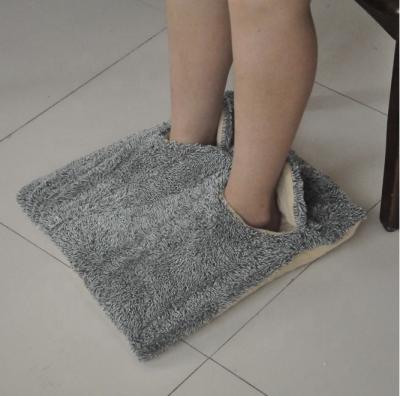 China Comfortable Hotel Plush Electric Heated Foot Warmer for sale