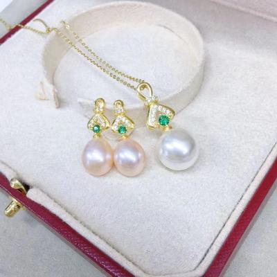 China Real CLASSIC Natural Freshwater 102S 8-12mm 925 Sterling Silver Pearl With Gold Plated Ring Dangle Earring Set Style For Gift for sale