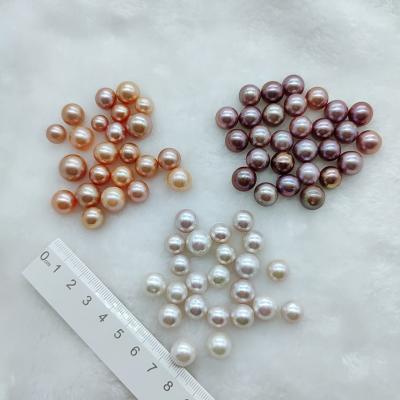 China Natural White Orange Purple Freshwater Pearl AAAA+ Grade 10-13mm Good Quality Loose Round Real Ediosn Genuine Cultured Freshwater Pearl for sale