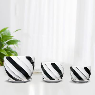 China Contemporary Garden Supplies Unique Plant Pot Small Ceramic Planter Flower Pot for sale