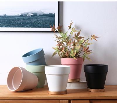 China OEM Style Morandi Contemporary Solid Color Nordic Ceramic Flowerpot With Tray Home Decoration Home Decor Cup Shape Ceramic Flowerpot for sale