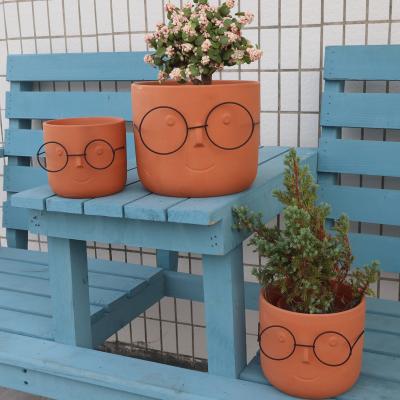 China Contemporary Smiley Design Ceramic Pot Home Decor Flower Face Flower Face OEM Ceramic Desktop Pot for sale