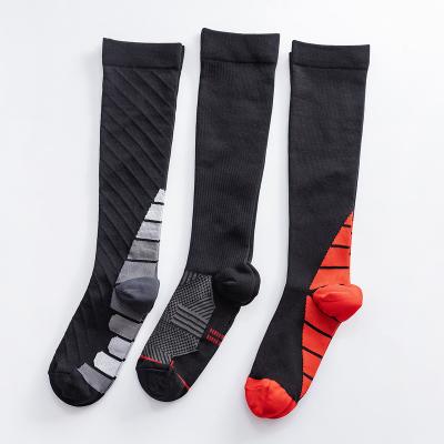 China Breathable Hot Sale High Elastic Sports Basketball Football Compression Sports Socks For Men for sale