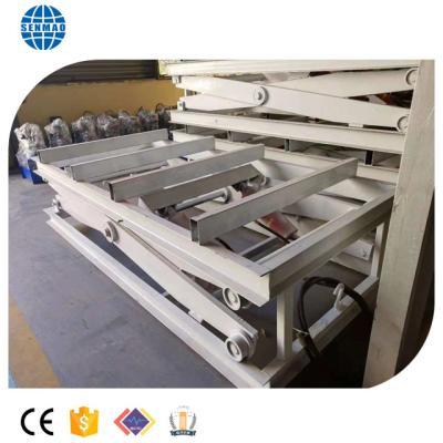 China Automatic machinery repair shops and double manual hydraulic scissor lift table in plywood production line for sale