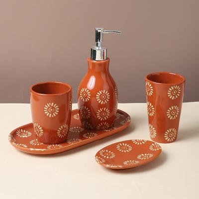 China Sustainable Hotel Used 5 Pieces Floral Embossed Ceramic Soap Dispenser Set Luxury Ceramic Bathroom Accessories Sets for sale