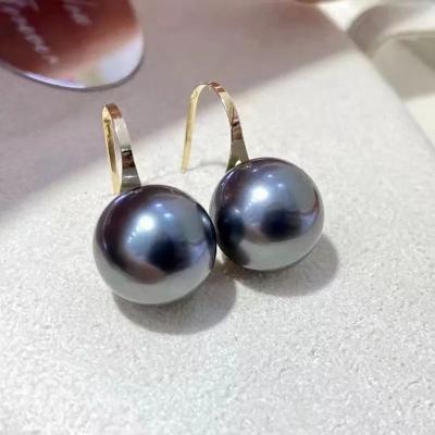 China FASHIONABLE Top Round Natural Ocean Pearl Grade 9-10mm Navigation Genuine Tahitian Pearl Stud Earrings 18k Gold For Women for sale