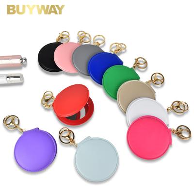 China Portable Candy Color Mini Leather Pocket Makeup Mirror Magnifying Key Chain Cosmetic Compact Mirrors With Key Chain for sale