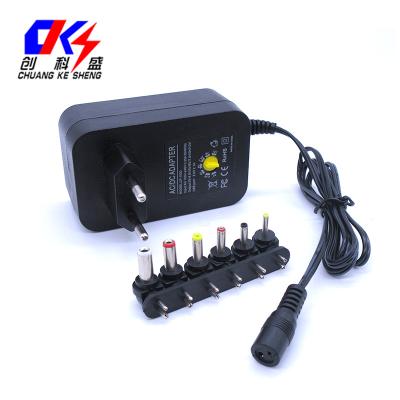 China Wholesale ABS+PC Adjustable 3V/4.5V/5V/6V/7.5V/9V/12V Power Adapter With 5V 2.1A USB Port for sale