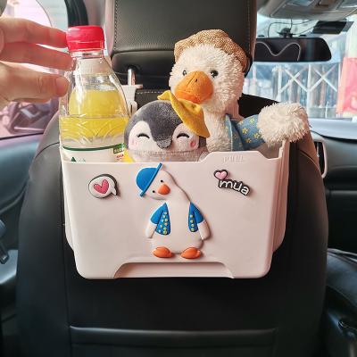 China Cute little cute car trash can storage box back seat car accessories girl car decoration seat interior storage box for sale