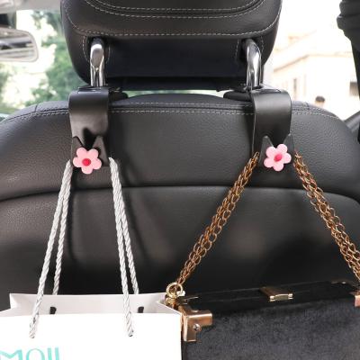 China Cute Universal Car Accessories Hook Backseat Car Hanger Holder Interior Portable Storage For Car Bag Purse Cloth Decoration for sale