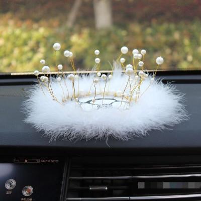 China Creative Anti-skid Car Interior Accessories Silica Gel Feather Car Decoration Mat Cute Silicone Mobile Phone Storage Mat for sale