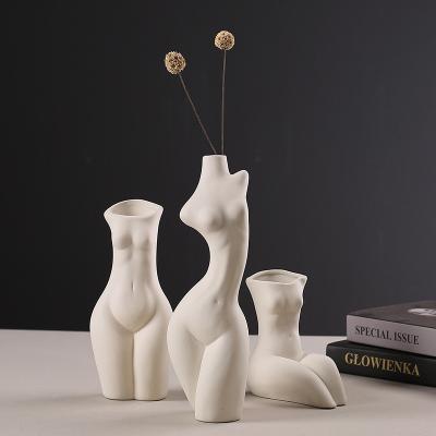 China Nordic White Ceramic Vase Desktop Minimalist YunChuang Design Female Body Ceramic Vases For Modern Home Decor for sale