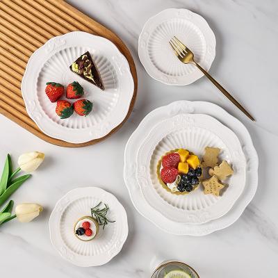 China Modern And Simple Style Stocked Embossed Ceramic Dinner Plates Dishes To Wedding Ceramic Dinnerware for sale