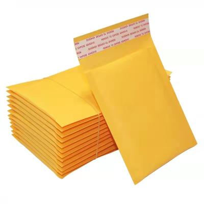 China Shipping in stock yellow kraft paper envelope bubble mailer bag for sale