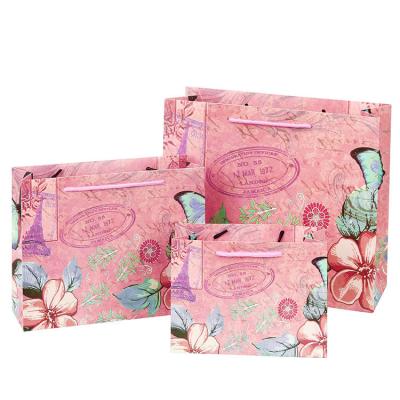 China Customized Luxury Creative Recyclable Butterfly Flower Gift Bag Shopping Paper Bags For Boutique for sale