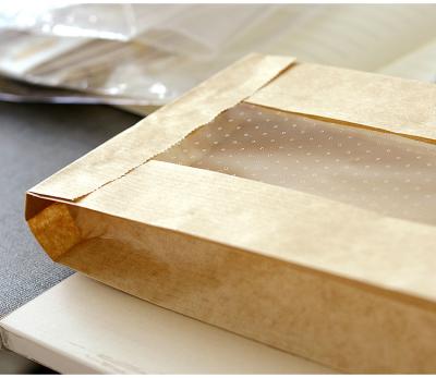 China Customized Printed Greaseproof Brown Kraftpaper 40gsm Baguette Wrapping Paper Bread Bag Biodegradable for sale