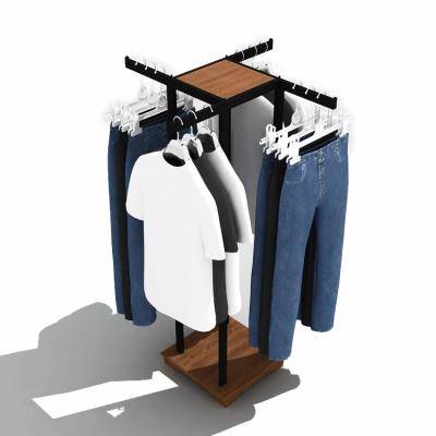 China Custom Store Clothes Store 4 Way Wood Metal Hanging Clothes Display Racks Stand Up Retail Clothing Rack for sale