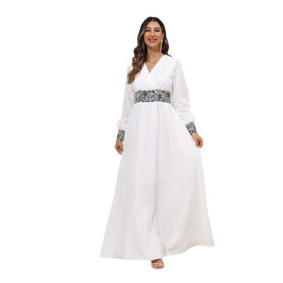 China New Year 2022 new year high long polyester fiber (polyester) Middle Eastern foreign trade V-neck simple waist skinny elegant Muslim dress for sale