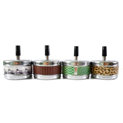 China Filter Sustainable Lowering Lid Cover Cleaning Spinning Spinning Automatic Stainless Steel Odorless Floating Ashtray for sale