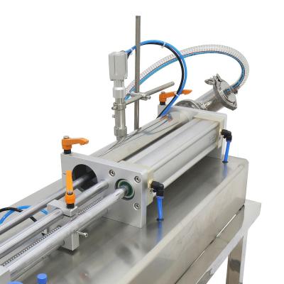 China The filling range of the machine is Adjustable Semi Automatic Oil Alcohol Filling Machine Liquid Horizontal Pneumatic Shampoo Filling Machine for sale