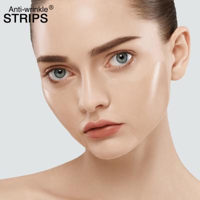 China Anti-wrinkle beauty cosmetics mascarillas facials v shape physical stretching slimming mask for sale