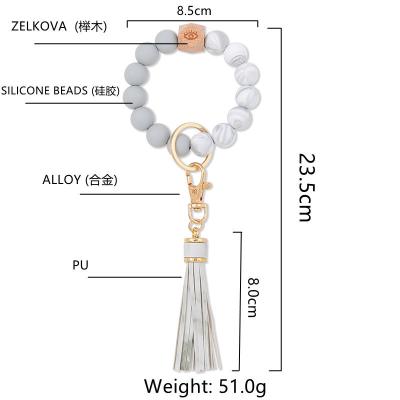 China 2021 decoration custom silicone beads elastic leather tassel key chain bracelet silicone beads bracelet key chain for sale