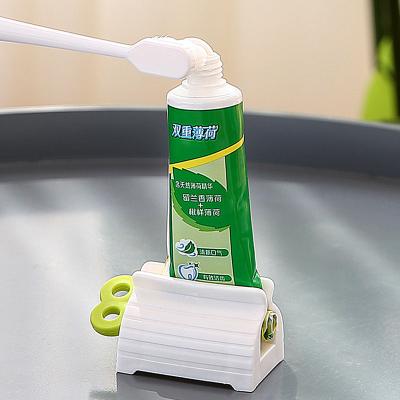 China Wholesale Travel Stocked Plastic Rolling Tube Toothpaste Squeezer Bathroom Set Accessories Can Customize Logo for sale