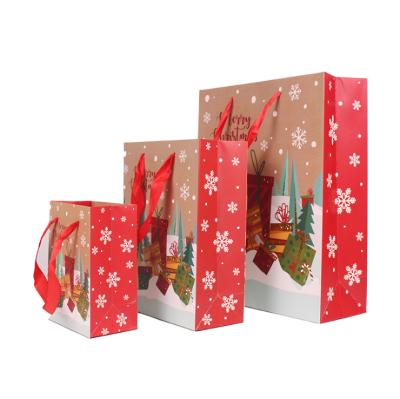 China Popular Materials Offset Printing Paper Bags Recycled Cheap Customized Christmas Gift Bag For Christmas New Year Eve for sale