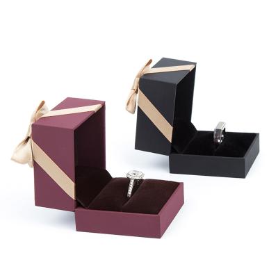 China Recycled Materials Wave Lid Packaging Cardboard Bespoke Magnetic Closure Ring Box Customized Makeup Ribbon EVA Gift Box for sale