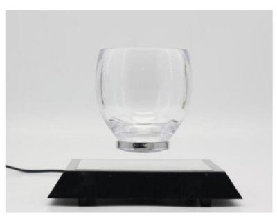 China 360 Rotating magnetic levitation Cocktail Glass cup display stands for sale