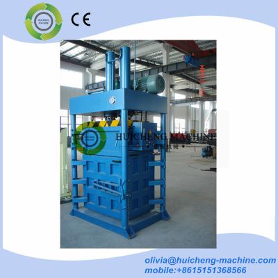 China Four doors opening vertical hydraulic baler hay press machine/Electric vertical hydraulic cotton baler machine for sale