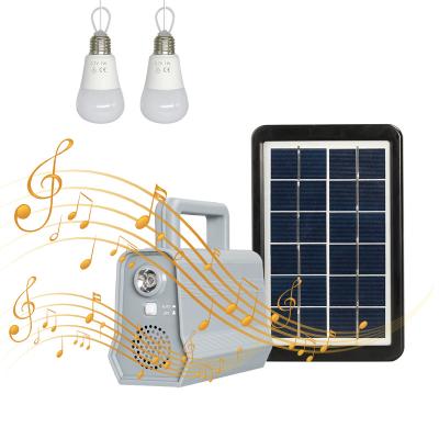 China Multifunctional solar power lighting system kits outdoor/home mini storage solar power system for home with speaker mp3 player for sale