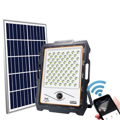 China wall mounted monitor led solar flood light with cctv camera led solar flood lights 100w 200w 300w 400w camera 1080p solar outdoor wall mounted monitor flood light garden with cctv camera for sale