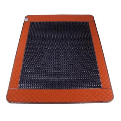 China Excellent Comfortable In Home Care Best Far Infrared Ray And Negative Ions Stone Heating Massager Nuga Tourmaline Pad for sale