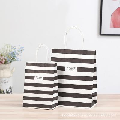 China Wholesale Luxury White Black Eco - Friendly Twine Bags With Ribbon Handle Lunch Gift Paper Bag for sale