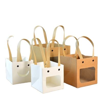 China Customize Luxury Reusable Handled Box Bottom With Window Clothing Gift Paper Bag for sale