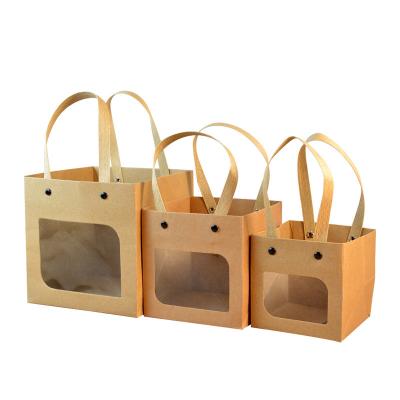 China Reusable Customized Small Luxury Kraft Packaging With Window PP Flat Handle Paper Bag for sale