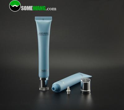 China Customized Cosmetic Moisturizing Eye Cream Plastic Tube With Silver Plated Acrylic Cap for sale