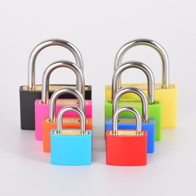 China Waterproof 30mm Colored Beautiful Plastic Covered Waterproof Brass Padlock Security Luggage Lock for sale