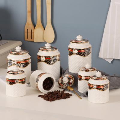 China Viable White Porcelain Flower Decal Ceramic Storage Coffee Tea Sugar Jar Jars With Lid Canister Sets for sale