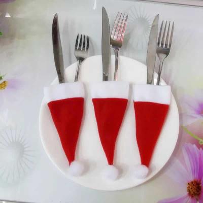 China Festival Stuff CR-B037 Red White Funny Christmas Present Utensil Holder For Christmas Dinner Table Decoration for sale